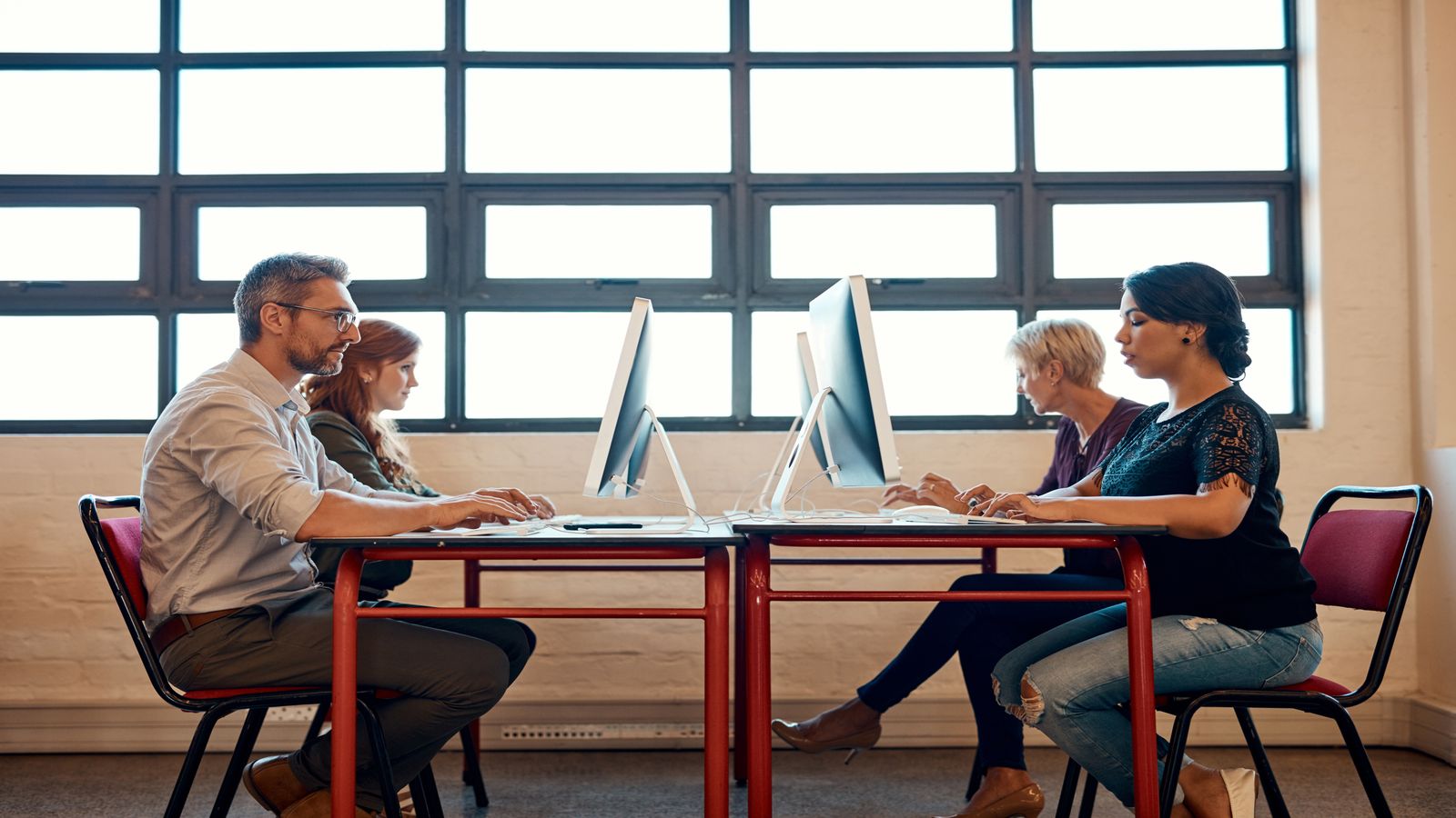 A napkin with a sketched app idea next to a laptop